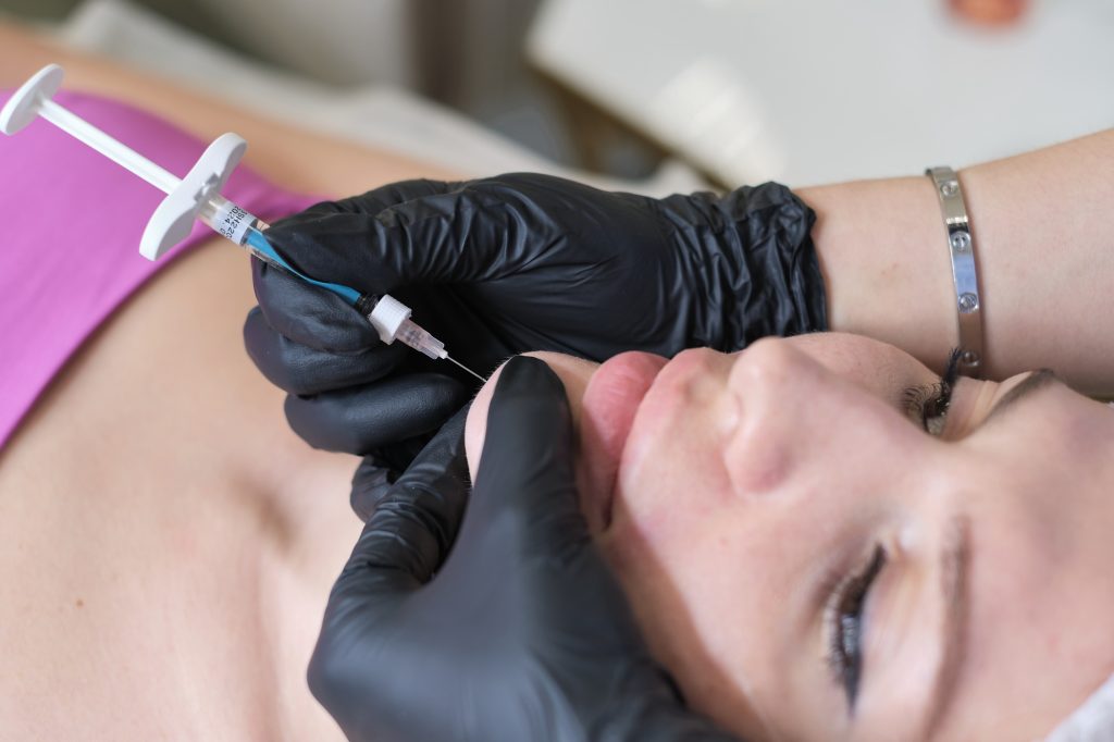 chin injection using hyaluronic acid, providing a glimpse into the precision required in such