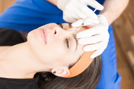 Botulinum Toxin Injected In Woman's Face